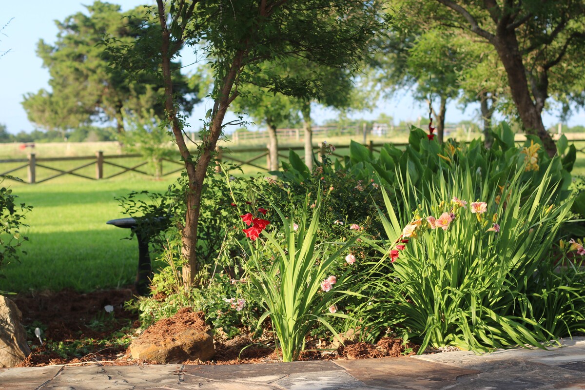 Vibrant flower gardens in bloom on the grounds