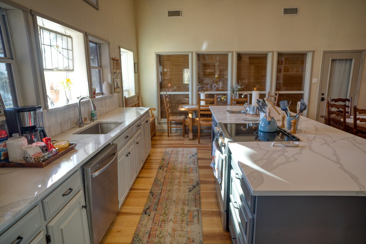 Kitchen with island and dining