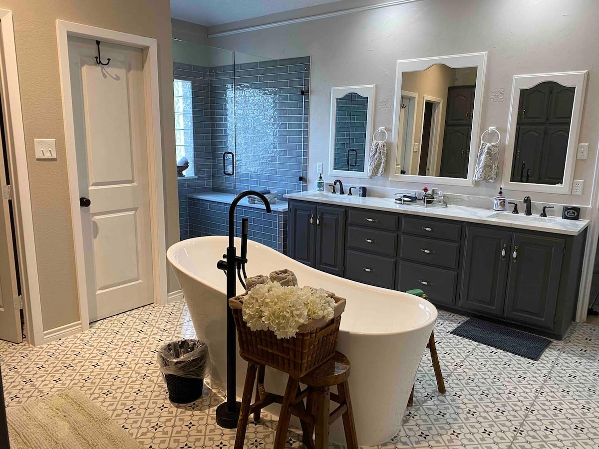 Bathroom with freestanding tub and double vanity