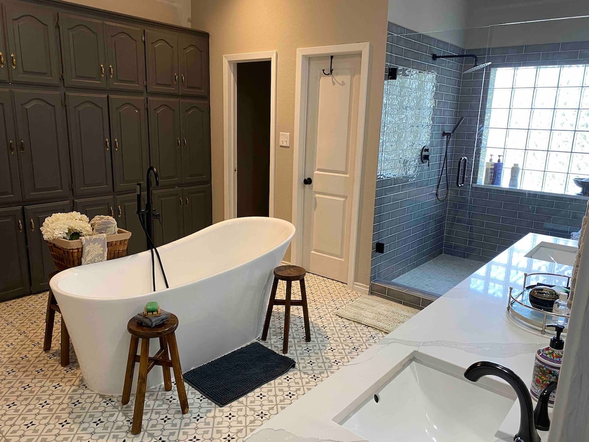 Bathroom with soaking tub and walk-in shower