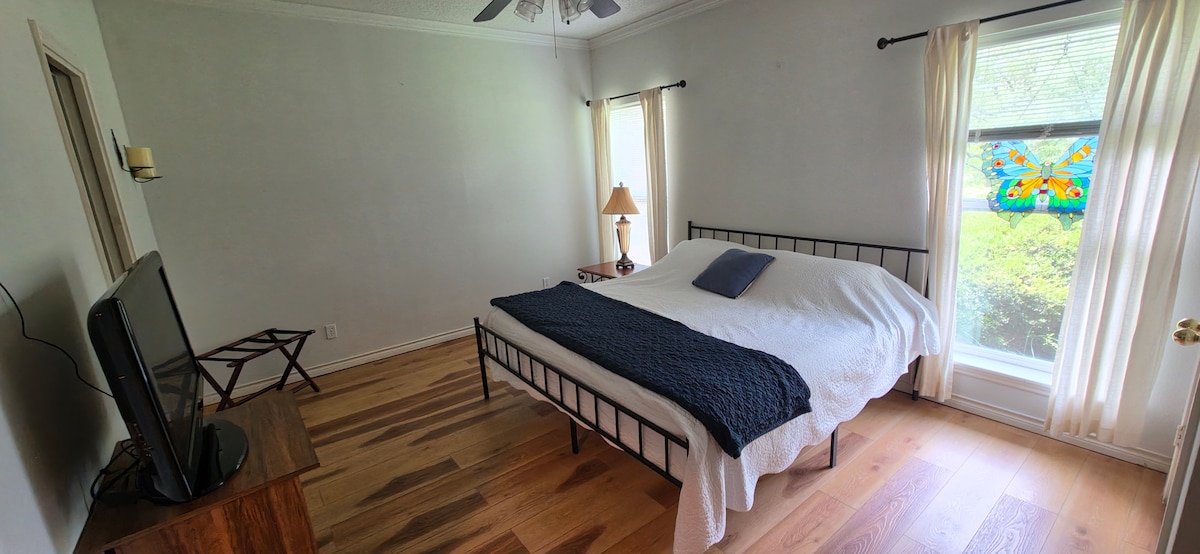 Guest bedroom with garden window